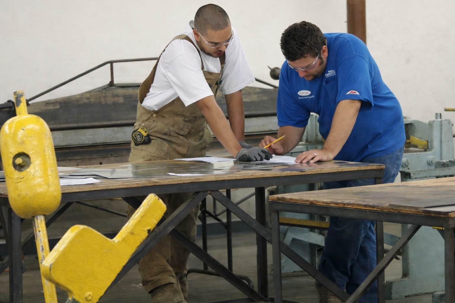 Two men working on a project